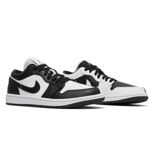 Side profile of Air Jordan 1 Low SE Homage black and white sneaker in Dubai.