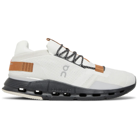 Cloudnova White Pecan sneakers side profile in Dubai setting