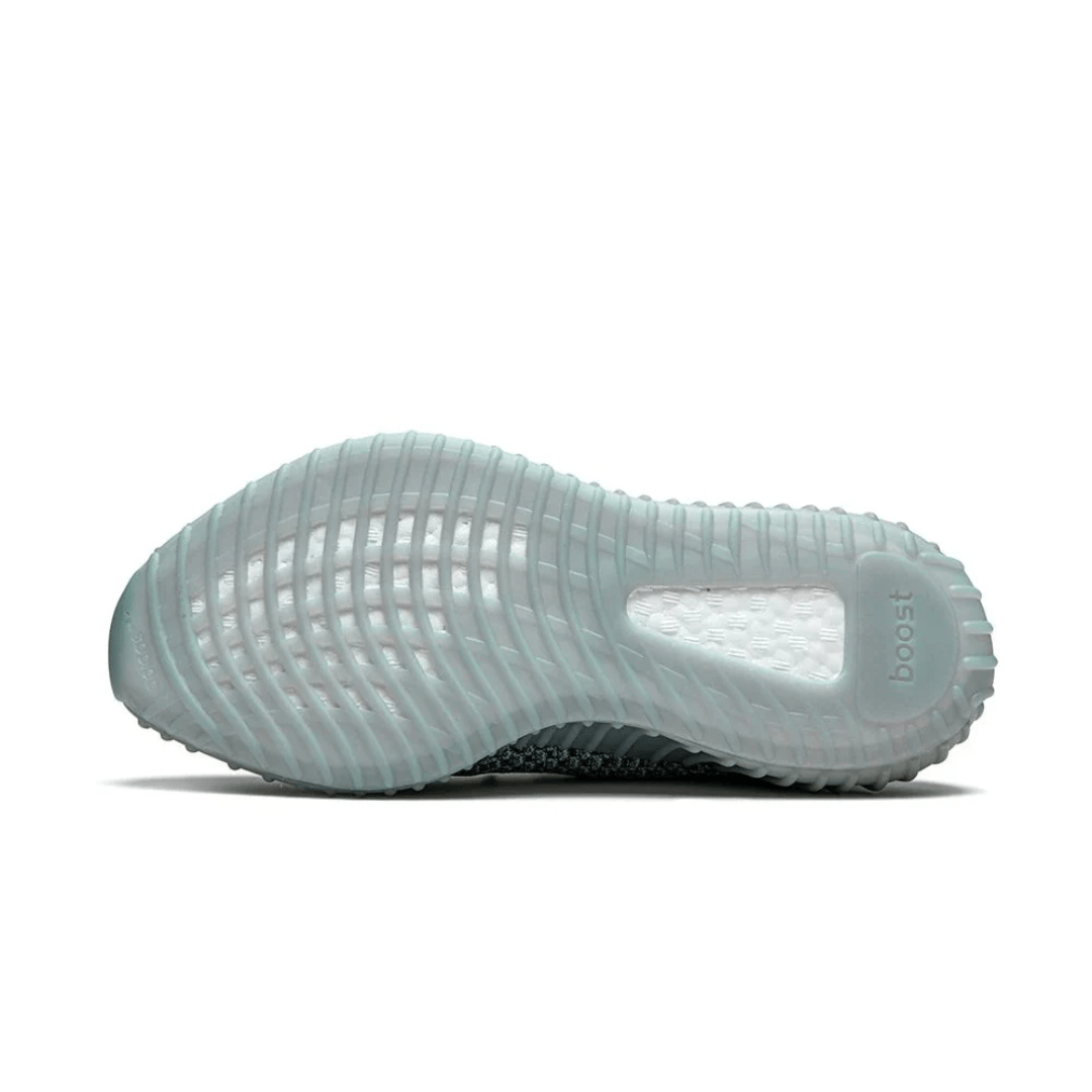 Lifestyle photo of Yeezy Ash Blue sneakers on Dubai streets