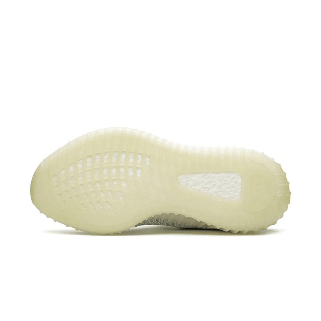 Primeknit upper detail of Yeezy Boost 350 Cloud White sneaker in Dubai