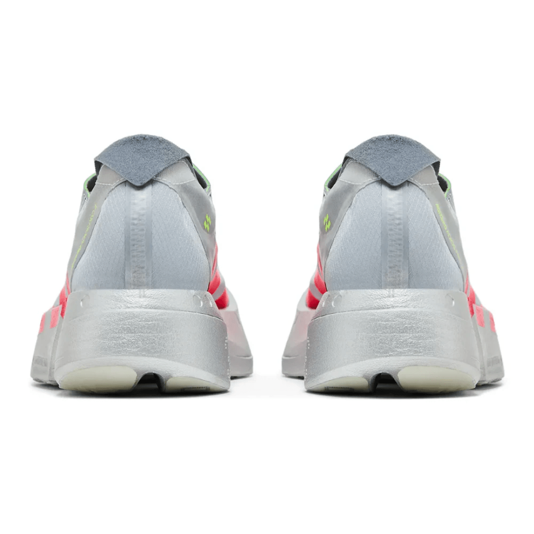 Runner wearing Adidas Adizero Adios Pro 4 Ekiden Pack along Dubai Marina UAE