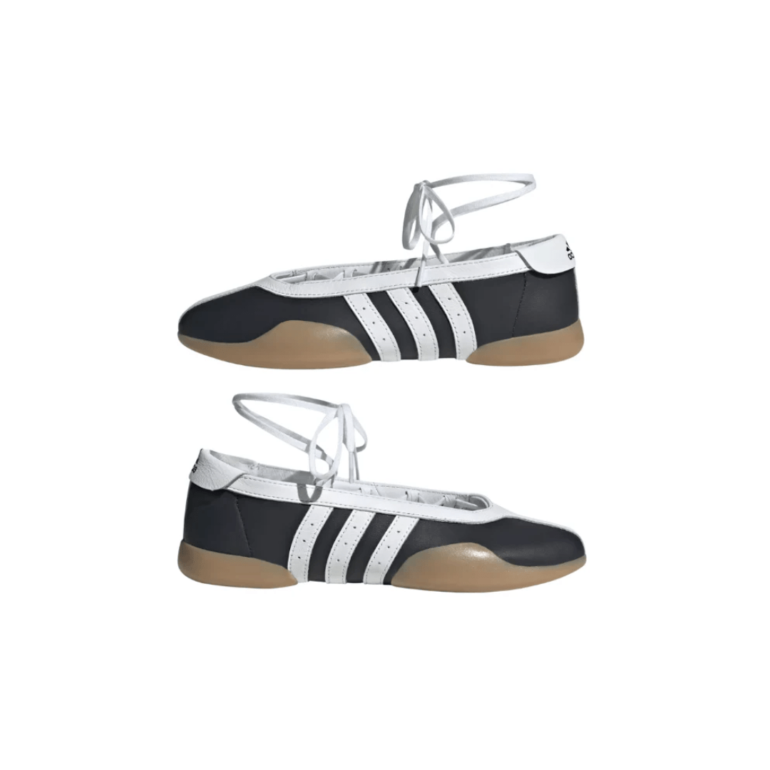 Adidas Chaussure Taekwondo Mei Black White displayed in Dubai training hall