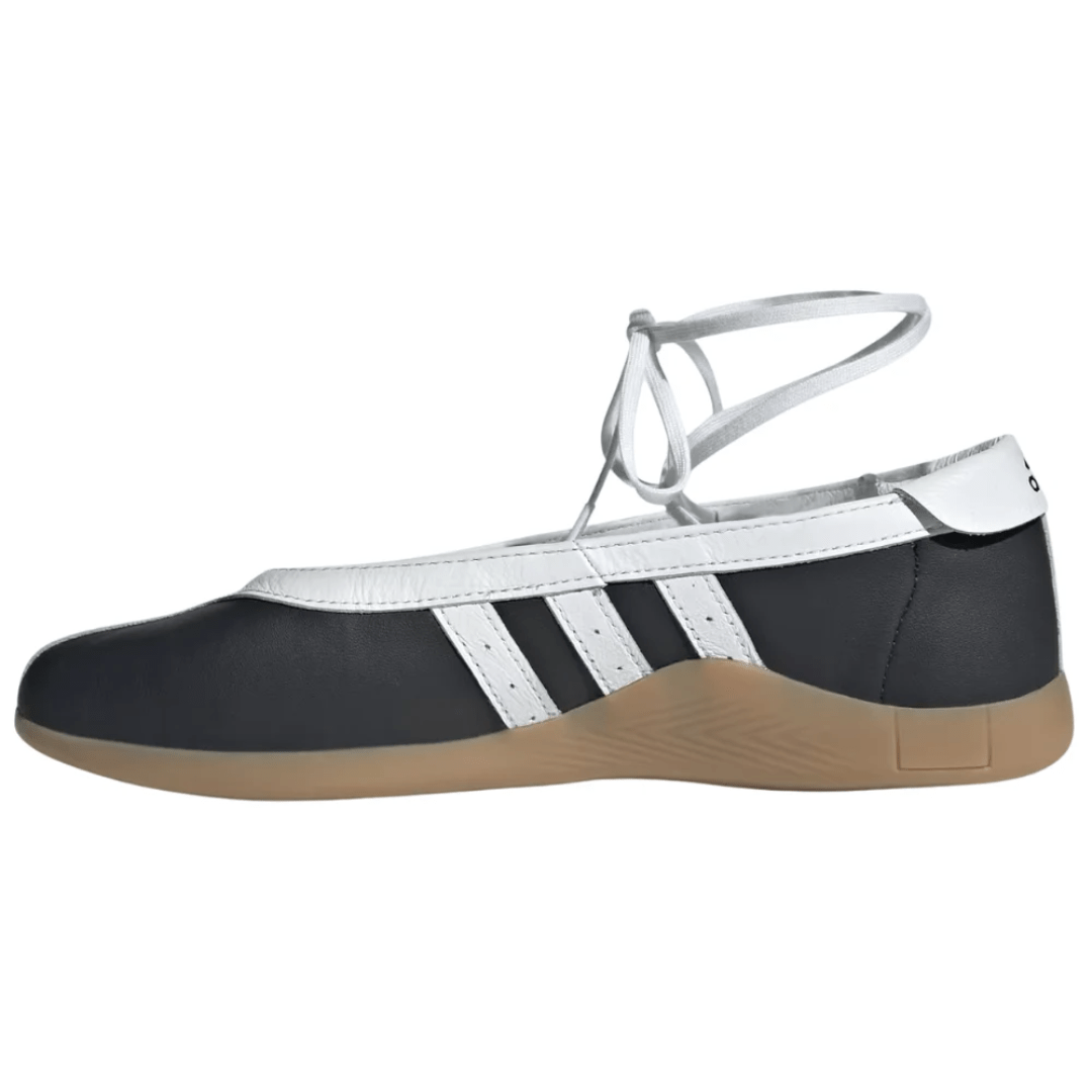 Close-up of Adidas logo and stitching on Taekwondo Mei Black White Dubai UAE