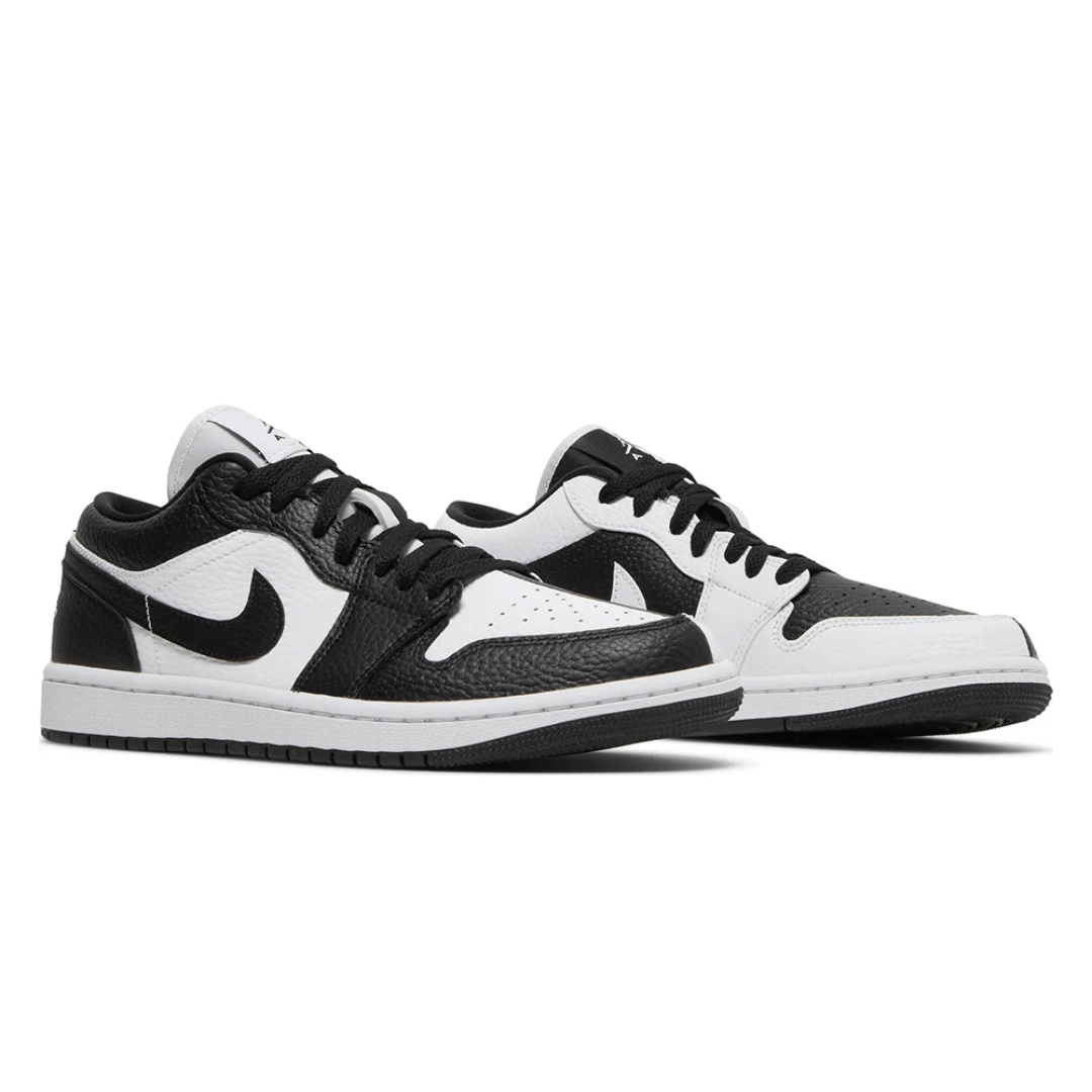 Side profile of Air Jordan 1 Low SE Homage black and white sneaker in Dubai.