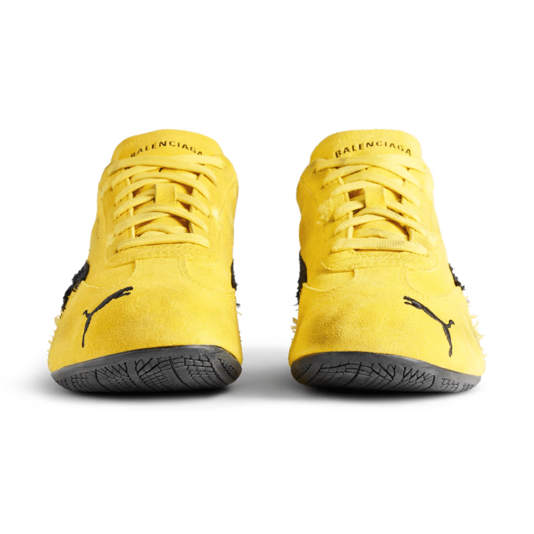 Side profile of Balenciaga Puma Speedcat Suede Yellow Black Dubai