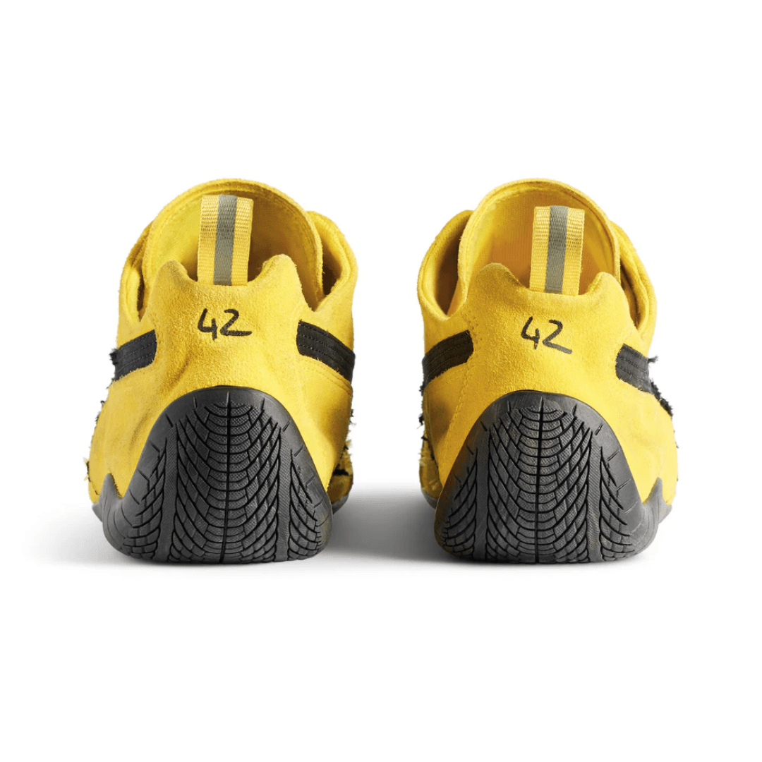 Balenciaga Puma Speedcat Suede Yellow Black on feet in Dubai