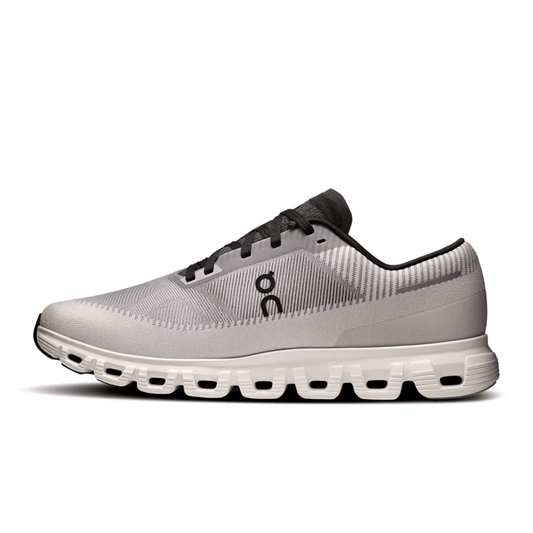 White running shoe with black accents on a white background