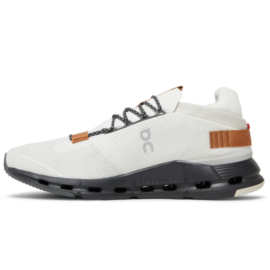 Pair of Cloudnova White Pecan sneakers on marble background
