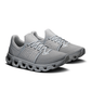 Gray running shoes with unique sole design on a white background