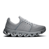 Gray running shoe with unique sole design on a white background