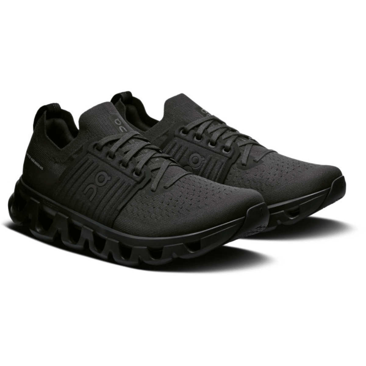 Black running shoes with a visible brand logo on a white background