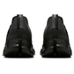Black slip-on shoes with brand logo on a white background