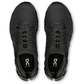 Black running shoes with 'on' logo on a white background