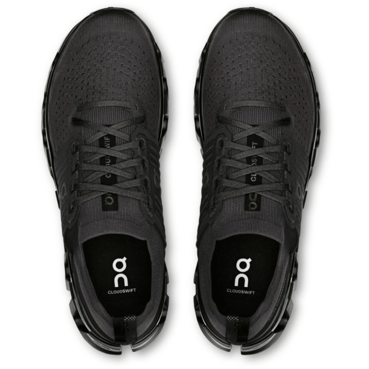 Black running shoes with 'on' logo on a white background