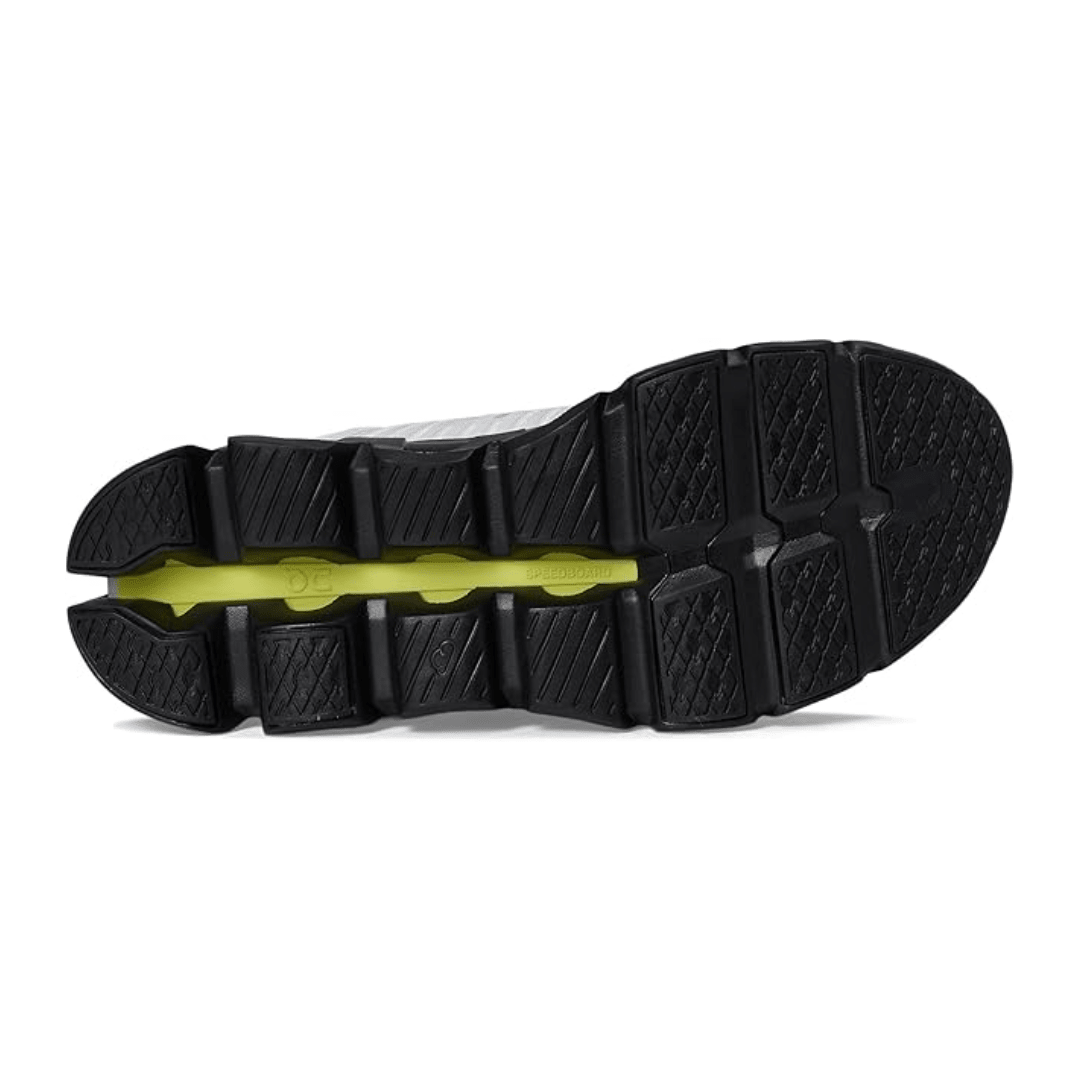 Close-up of a black shoe sole with a white background