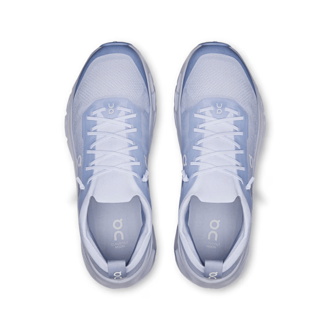 Pair of light blue athletic shoes on a white background