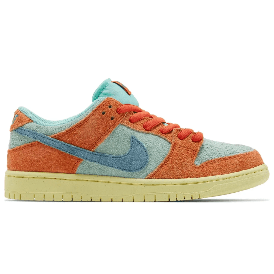 Side view of Nike Dunk Low SB Orange Emerald Rise sneaker in Dubai.