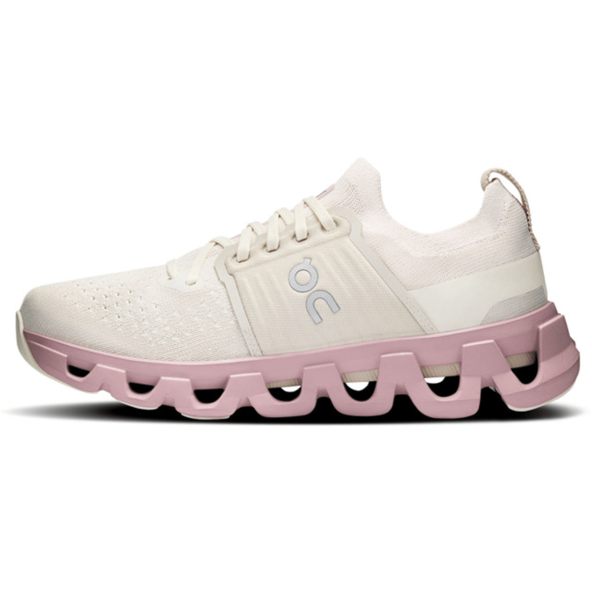 White and pink running shoe with 'on' brand logo on a white background