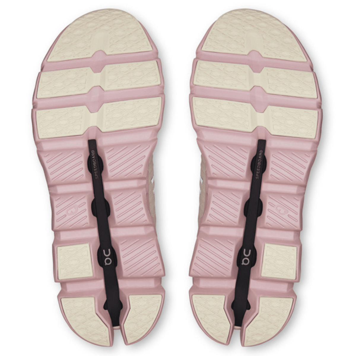 Pair of pink sandals with white soles on a white background
