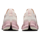 Pink and white running shoes shown from the back on a white background