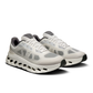 Laces and layered upper of On Cloudtilt Remix Alloy Ivory