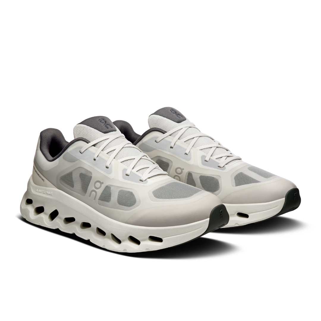 Laces and layered upper of On Cloudtilt Remix Alloy Ivory
