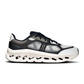 Side profile of On Cloudtilt Remix Black Ivory shoes