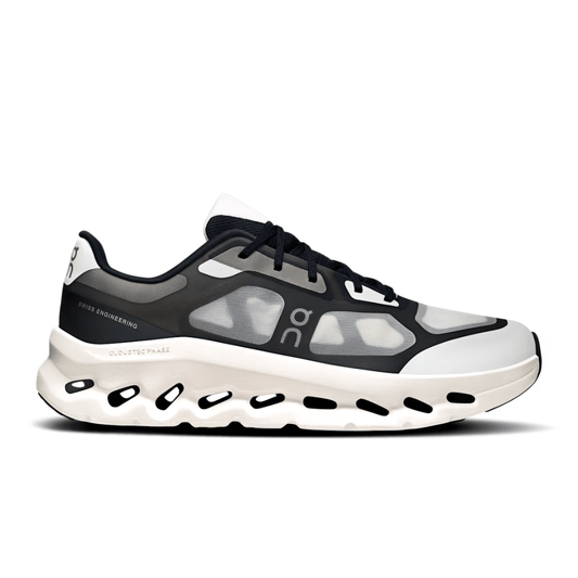 Side profile of On Cloudtilt Remix Black Ivory shoes