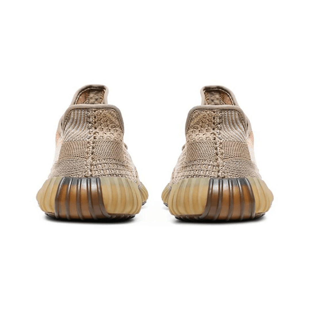 Yeezy Sand Taupe sneakers styled in Dubai desert setting UAE