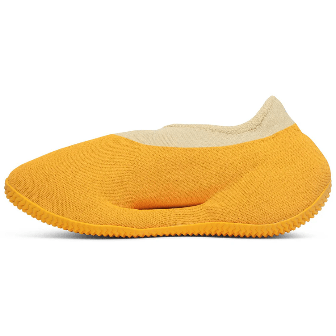 Side angle view of Yeezy Knit Runner Sulfur UAE