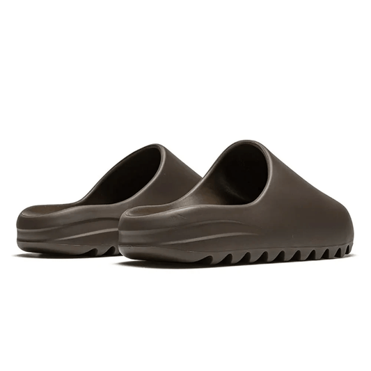 On-feet Adidas Yeezy Slide Soot lifestyle shot Dubai UAE