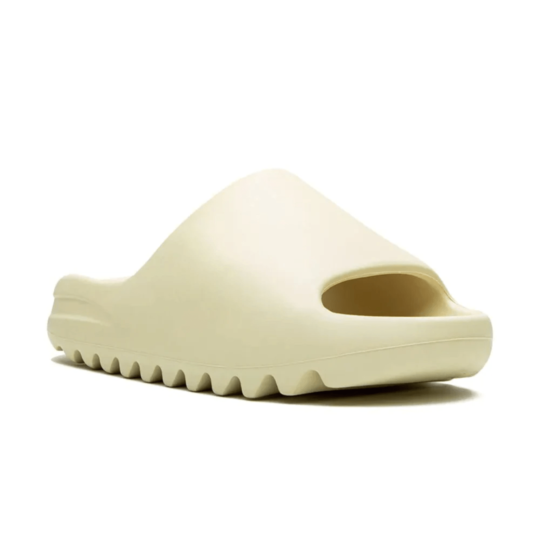 Side angle view Yeezy Slides Bone UAE